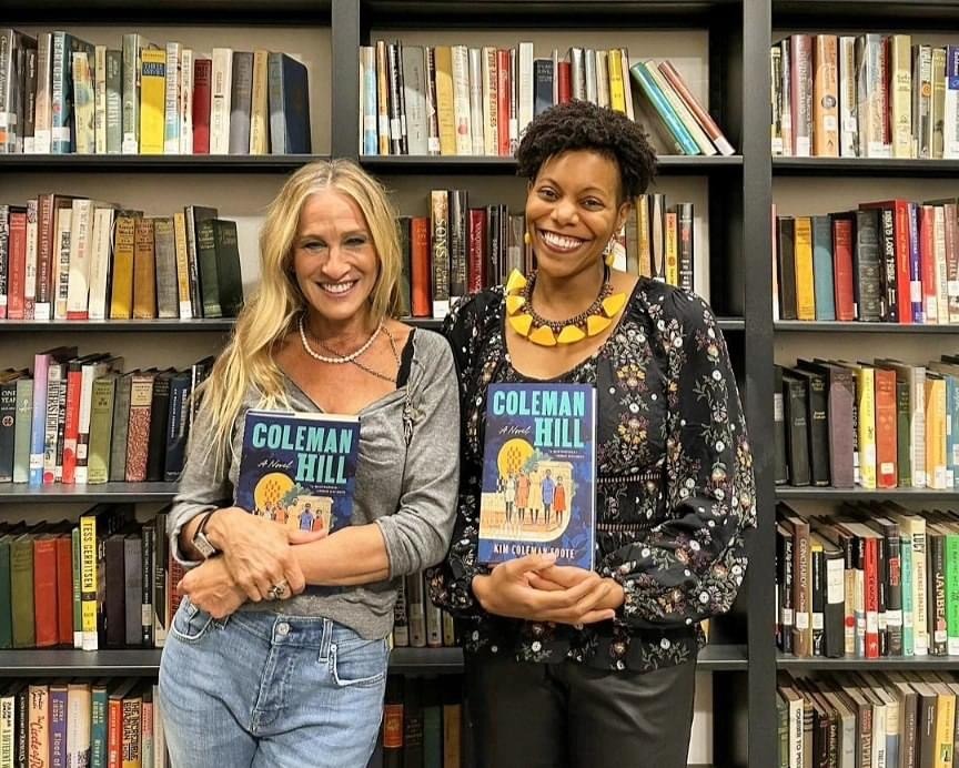 the author with Sarah Jessica Parker holding copies of Coleman Hill